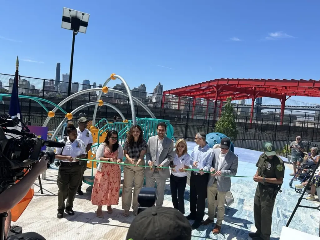 Ribbon cutting celebrating opening of playground