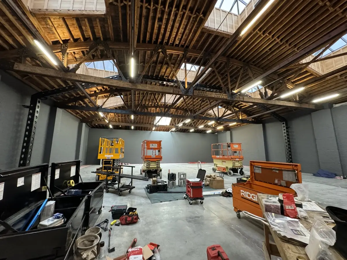 A wide view of the facility showcasing the truss structure designed by McLaren Engineering Group