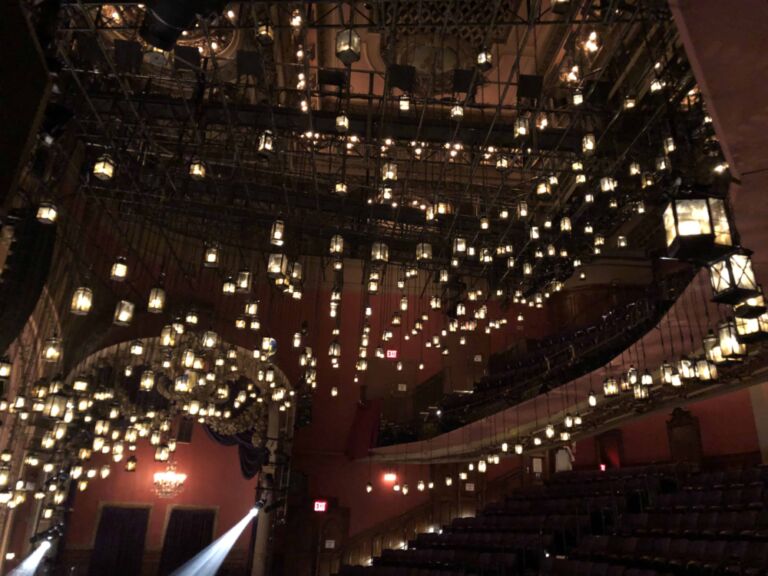 Broadway's Christmas Carol Truss Structure loaded with vintage lanterns