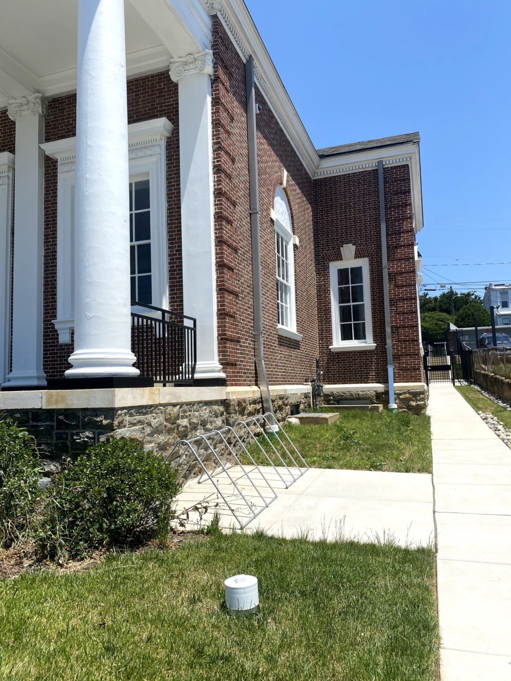 Hampden Branch Library renovated with bike rack, sidewalk, and drainage