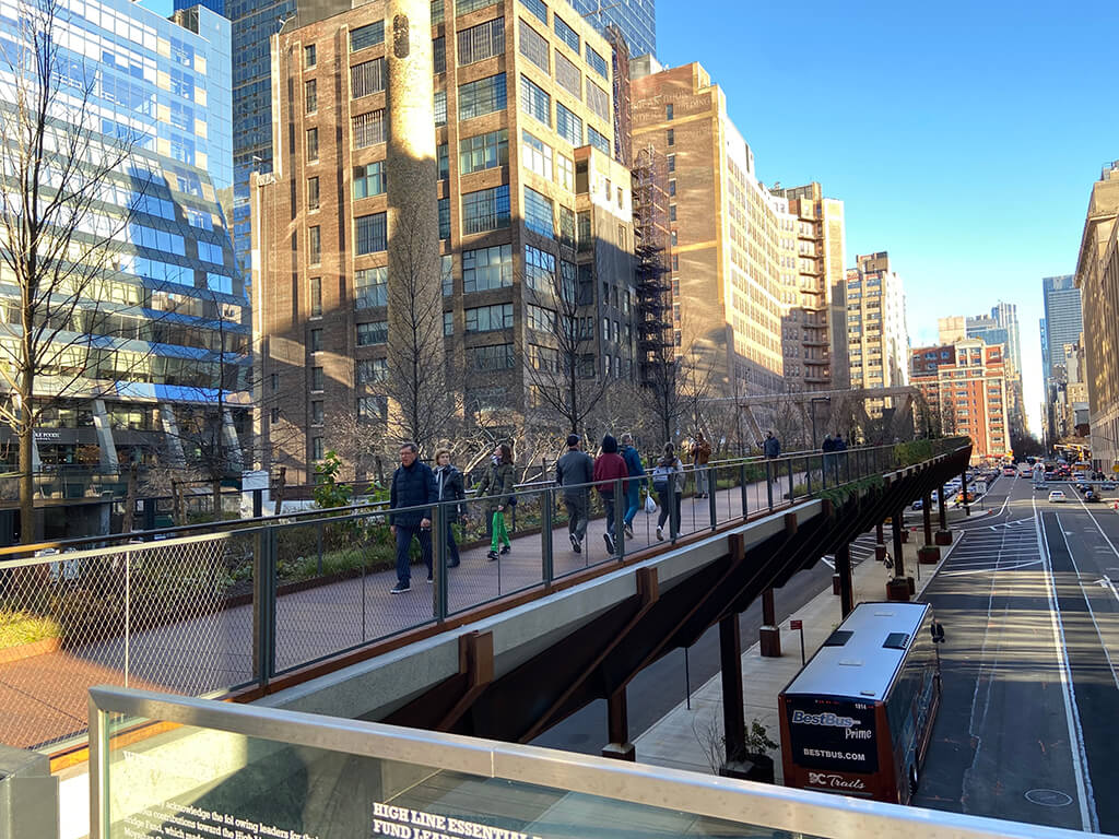 People Using the High Line Moynihan Connector, an elevated walkway