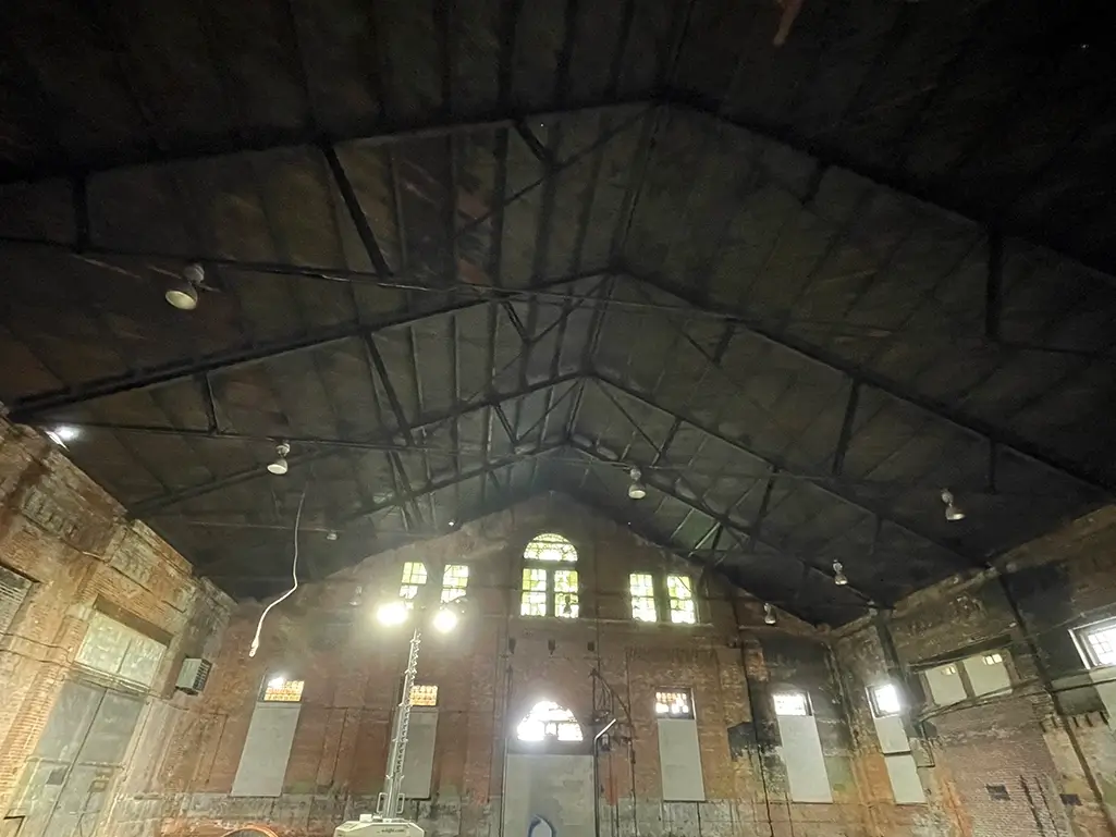 The interior of the historic Car Barn in Baltimore, before adaptive reuse renovations.