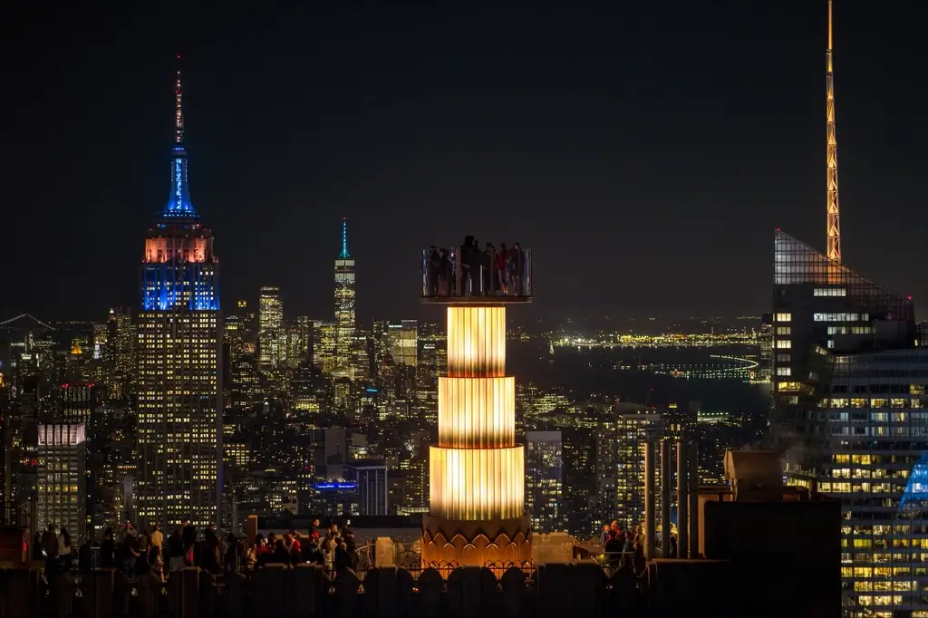 The Rockefeller Center Skylift with NYC Skyline in the background