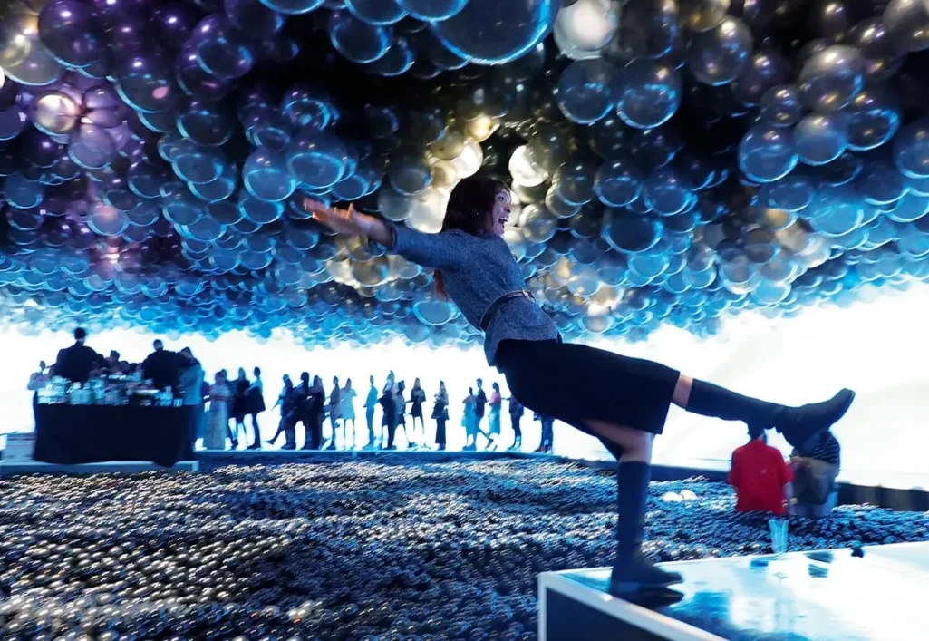 4,000-square-foot ball pit at the "Let's Fly" Installation at NYC's Balloon Museum Pop Up