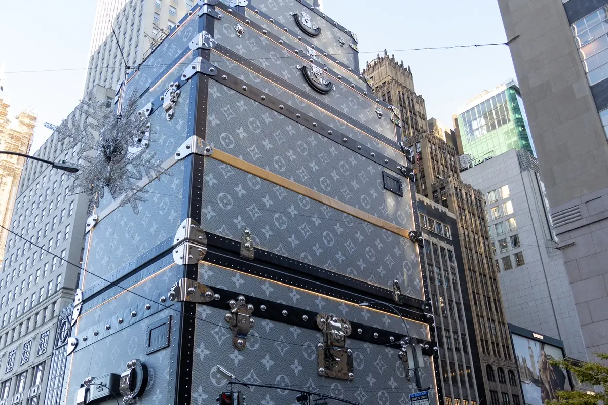 Front facing view of Tiffany's Louis Vuitton trunk installation during the day